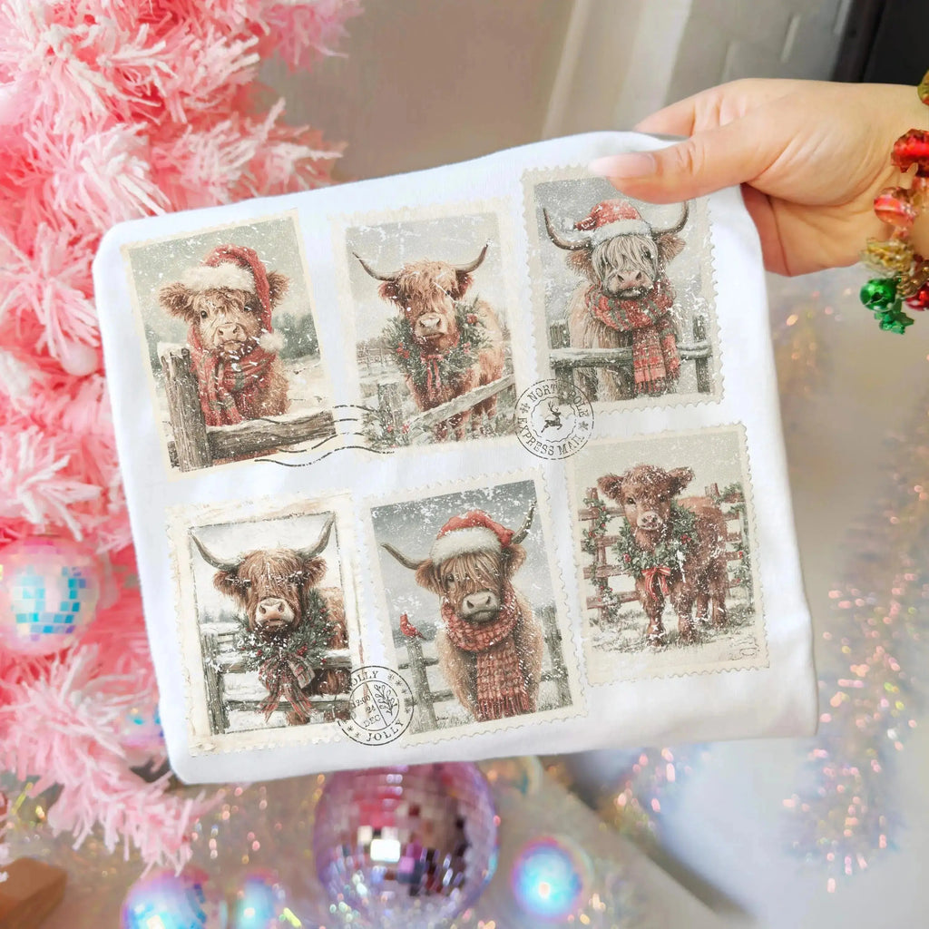 Highland Cow Christmas Stamps – Tee / Long Sleeve / Hoodie / Crewneck