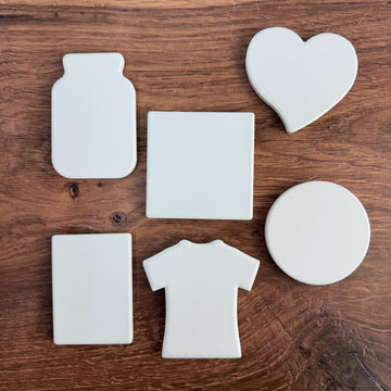 Blank ceramic magnet shapes before printing