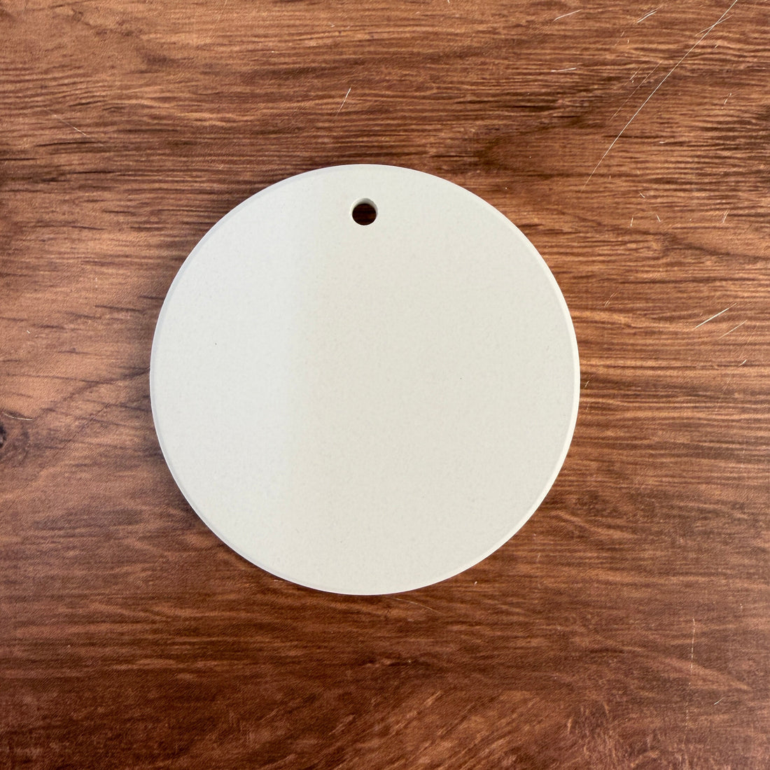 Blank ceramic ornament with gold hanging string
